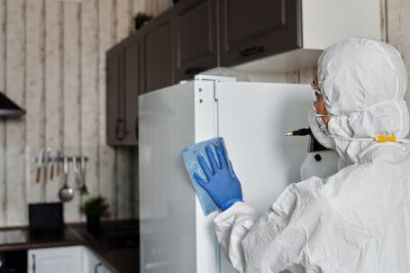 Disinfect - Person In A Protective Suit Disinfecting Inside The House